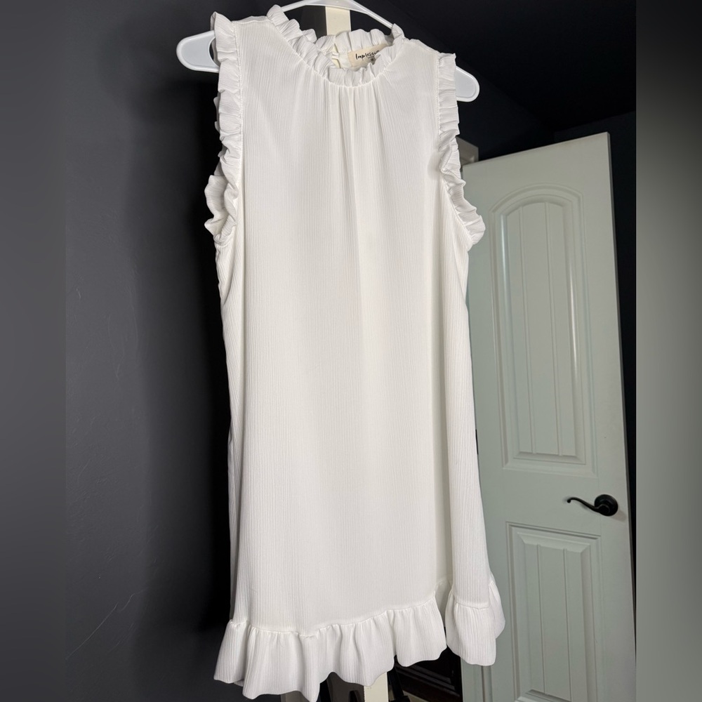 White ruffle dress. Size Medium.